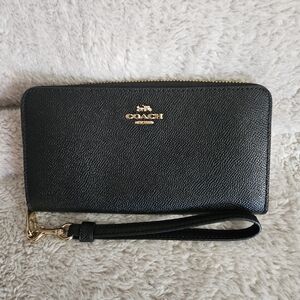 Coach Black Wristlet with Gold Accents